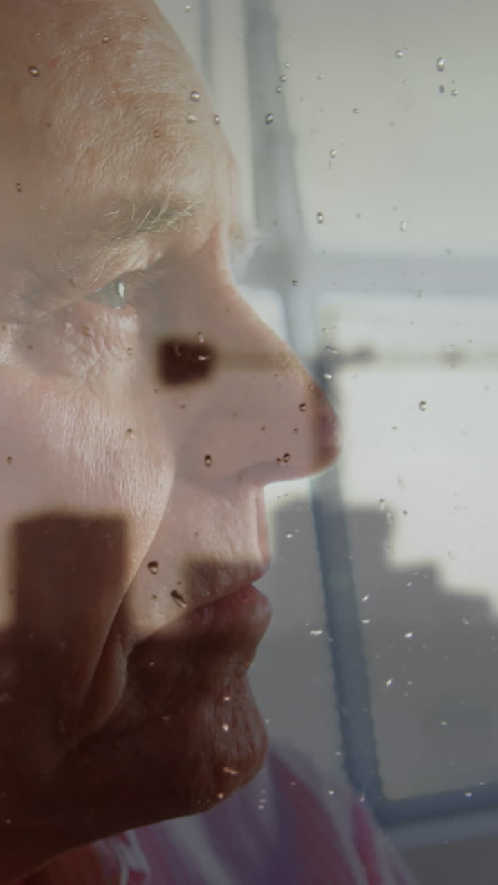 Animation of cityscape over sad senior caucasian man