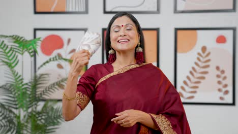 Indian-woman-happy-seeing-money