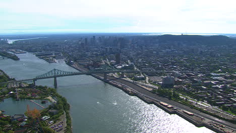 Downtown-Montreal-City,-Canada-on-Sunny-Summer-Day,-Helicopter-Aerial