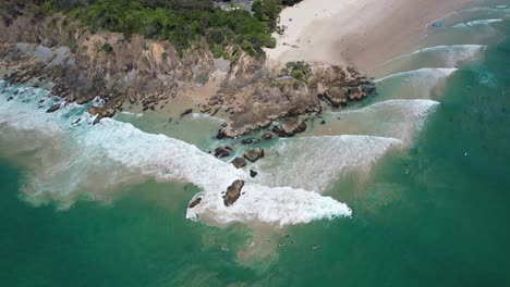 Foamy-Waves-And-Turquoise-Ocean-At-Clarkes-Beach-In-New-South-Wales,-Australia---aerial-shot