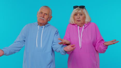 confused senior old grandfather grandmother having doubts, no idea, being clueless and uncertain