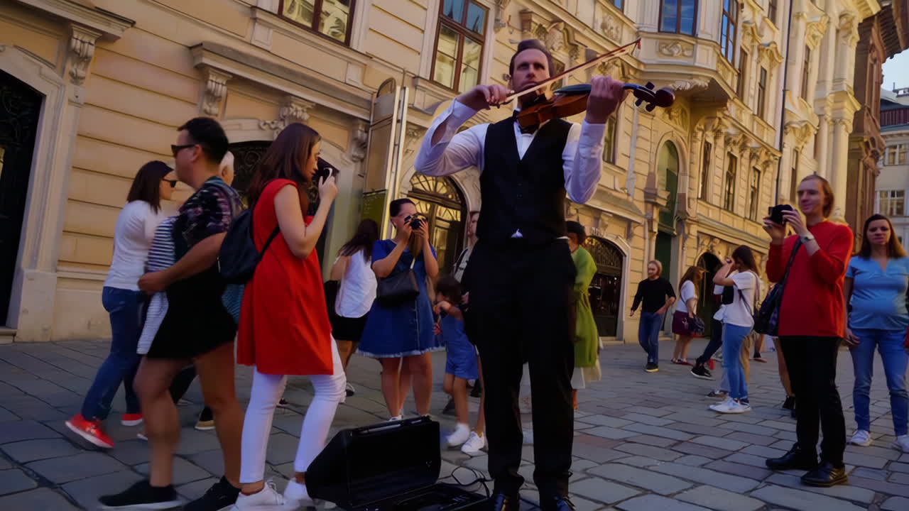 Street Violinist Entertains Tourists in European City