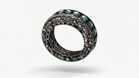 ornate silver ring with blue gemstones floating on white background