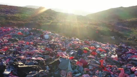 Dramatic aerial over refugee lifejackets Lesvos Island