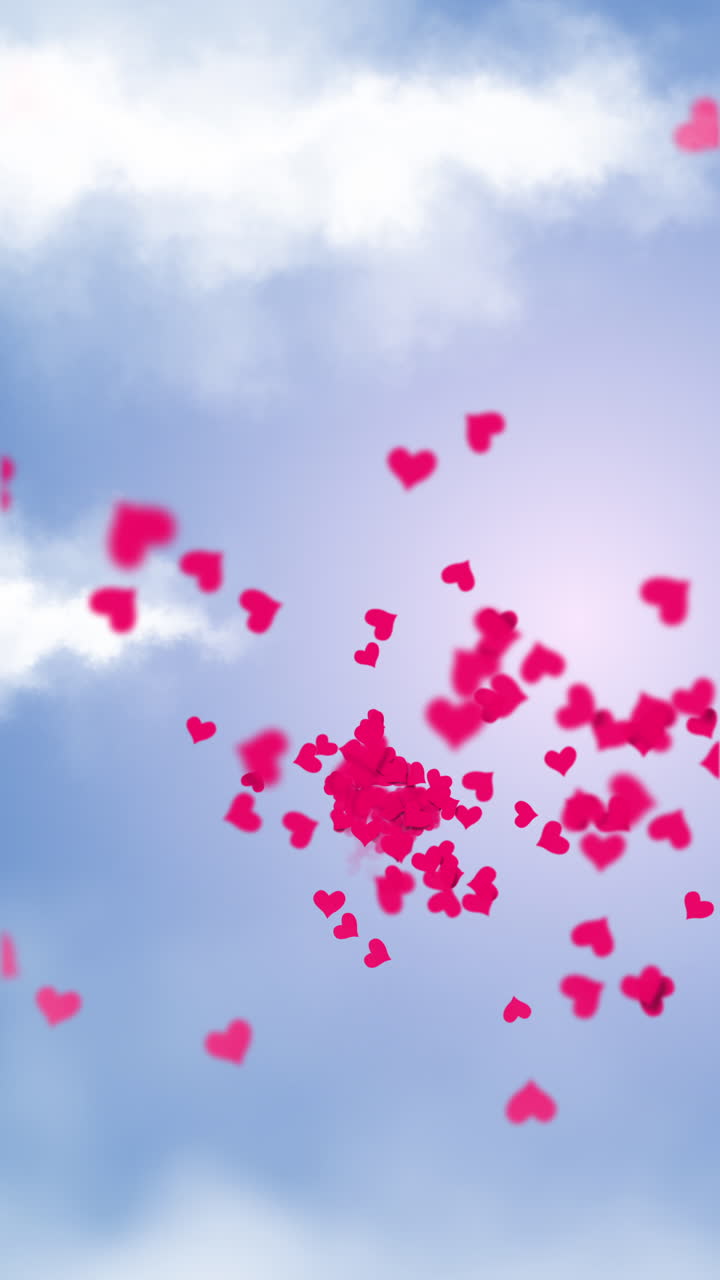 Paper art of heart balloon flying and scattering little heart in the sky, origami and valentine's day concept. Loop animation. Vertical video.