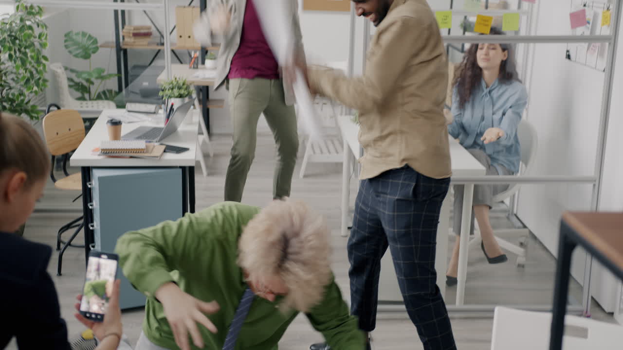 Office chaos, celebration