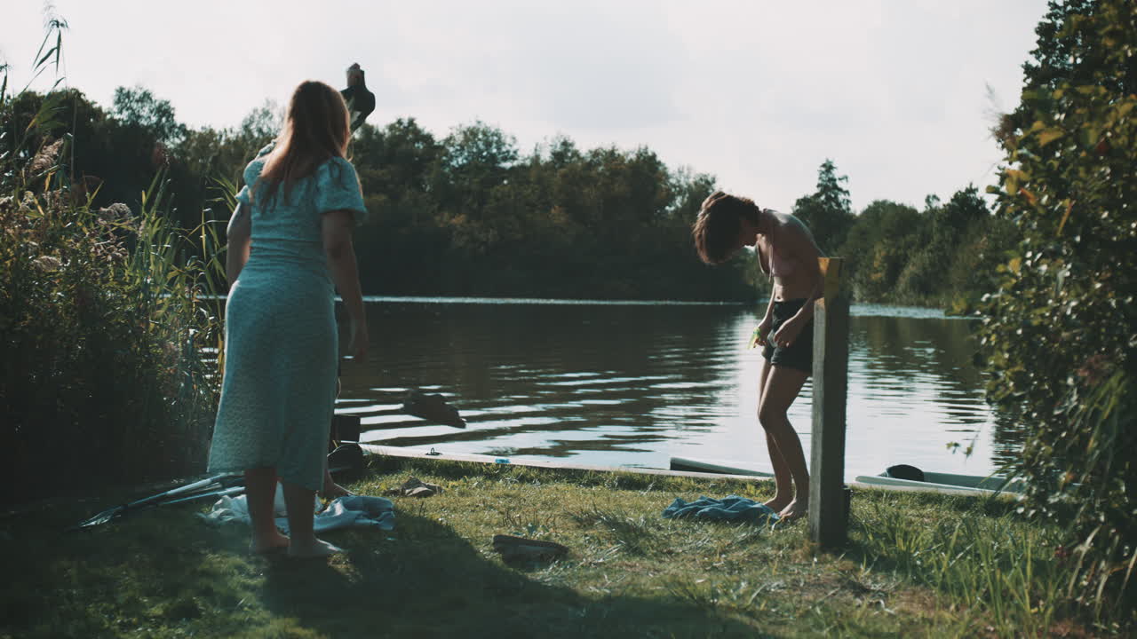 Friends enjoying a day by the river