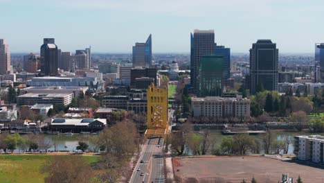 slow and cinematic drone shot flying in toward the tower bridge in sacramento