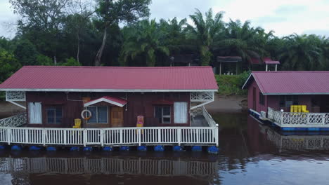 drone pan shot of floating houses in rompin pahang, malaysia