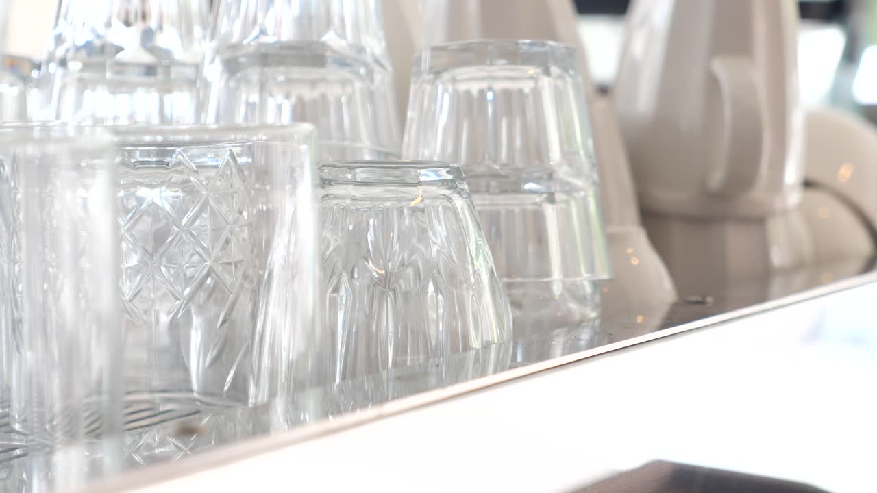 Clean Glasses on a Coffee Shop Counter