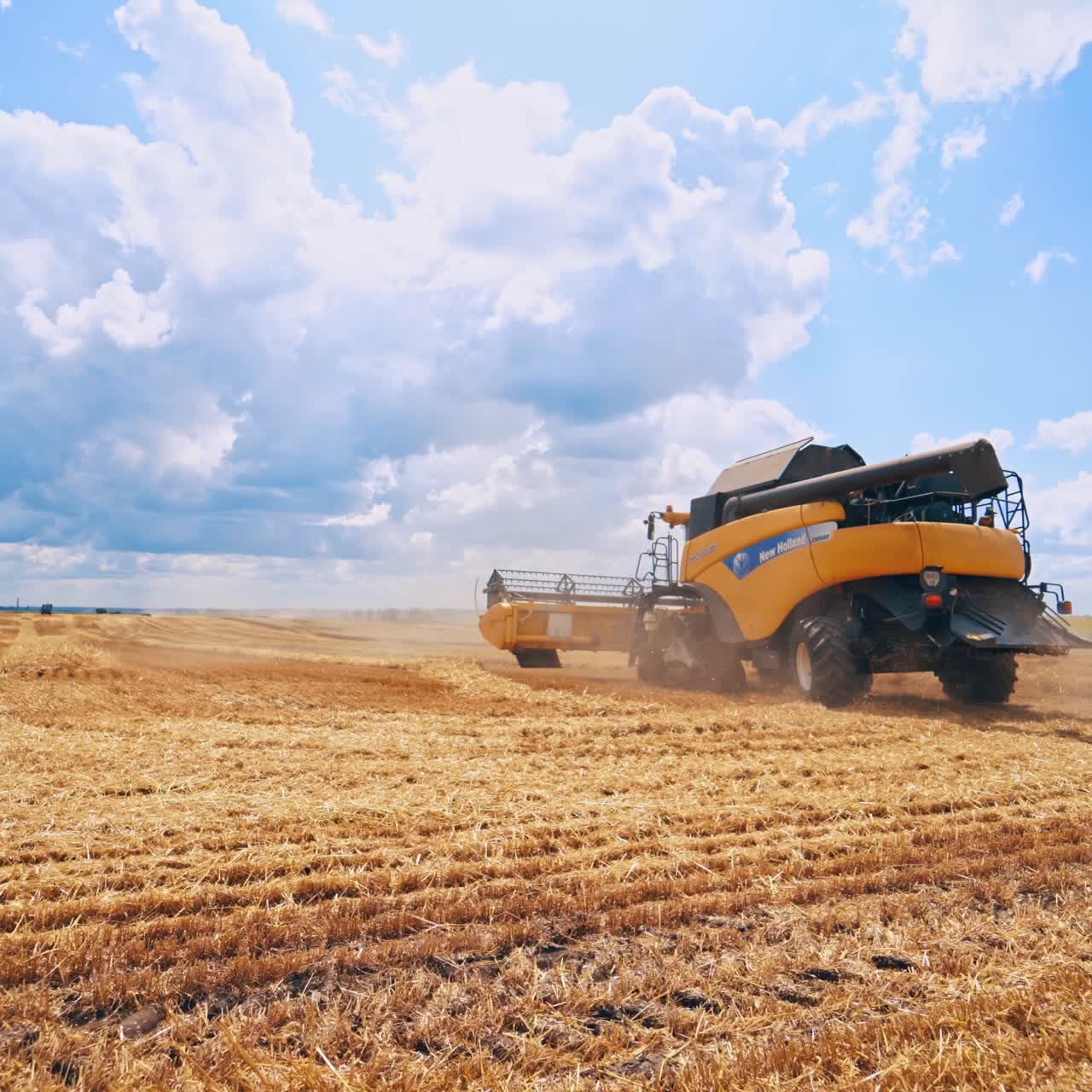 Harvesting machine working in field