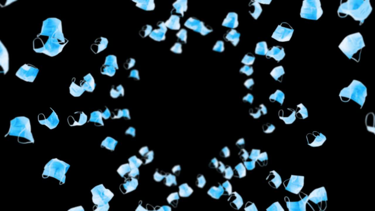 검은 바탕에 많은 파란 마스크를 날아. 의료 개념. 수술 보호 마스크. 마스크 회전의 3d 애니메이션. 루프 애니메이션.