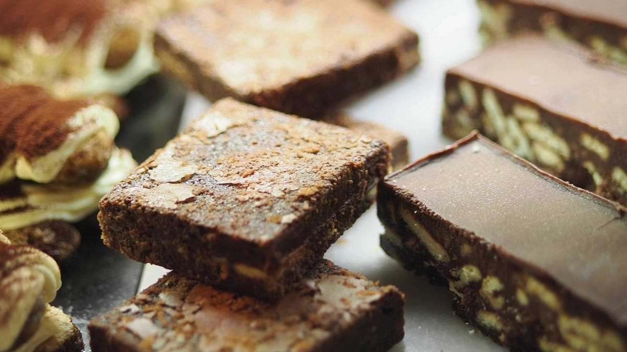 Assortment of Delicious Chocolate Brownies and Biscuits