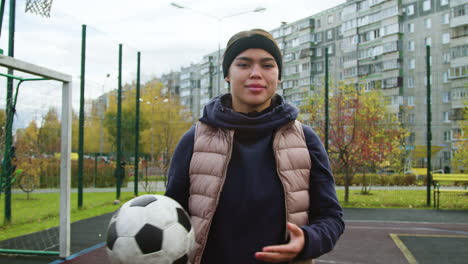 woman holding a ball