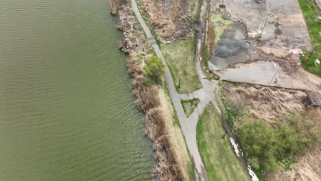 An-aerial-view-over-Flushing-Meadow-Corona-Park-in-Queens,-NY-on-a-sunny-day