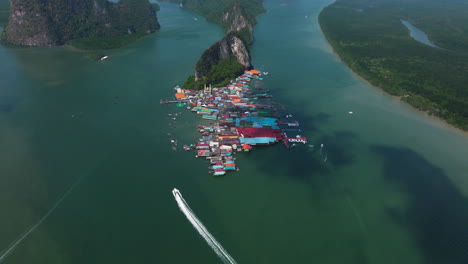 drone shot over ko panyi also known as koh panyee in phang nga province, thailand