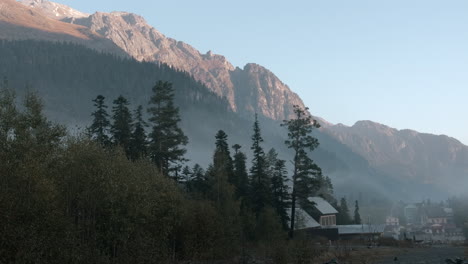 misty mountain valley at sunrise/sunset