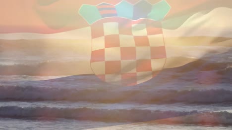 Digital-composition-of-waving-croatia-flag-against-view-of-the-beach-and-sea-waves