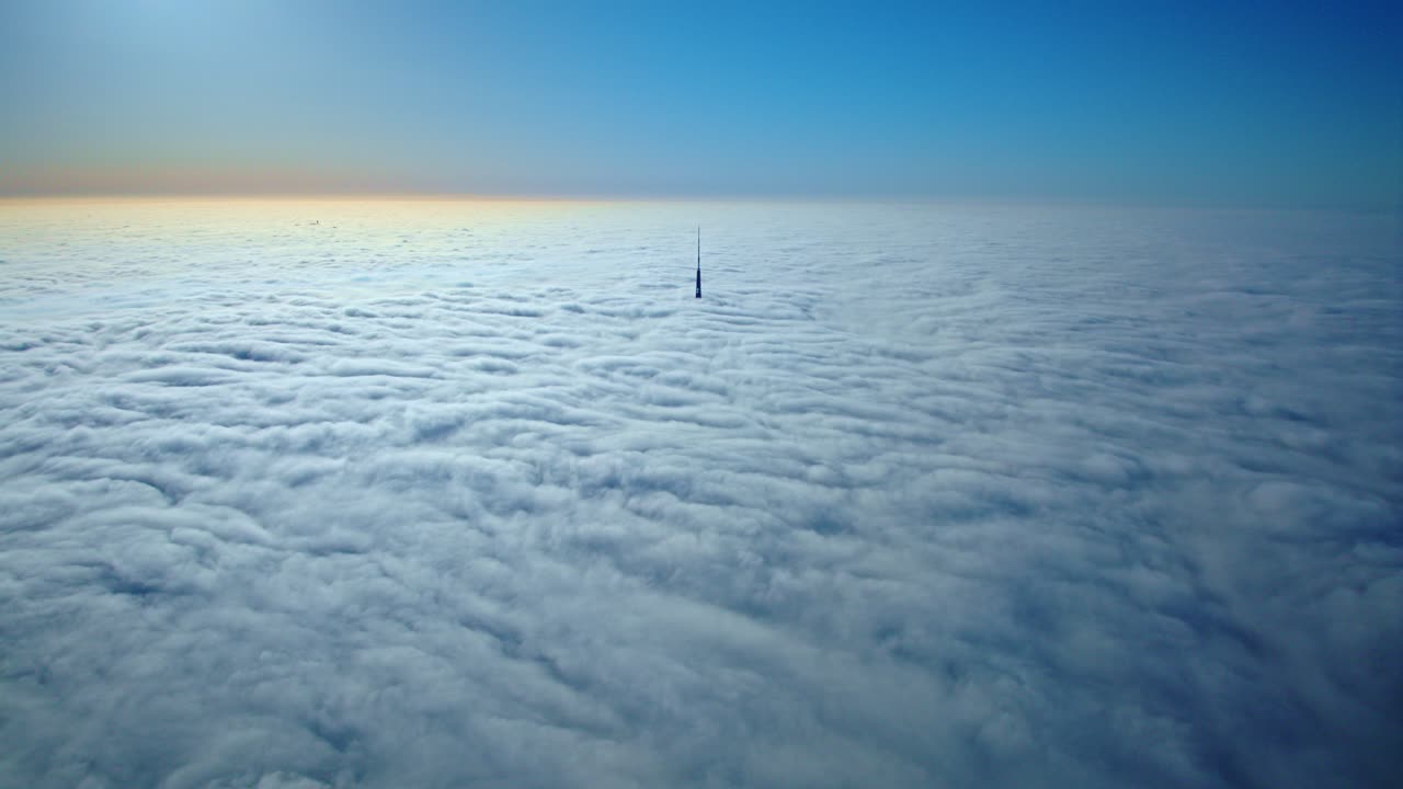 Stunning timelapse over Riga, Zakusala TV tower peeking through morning clouds