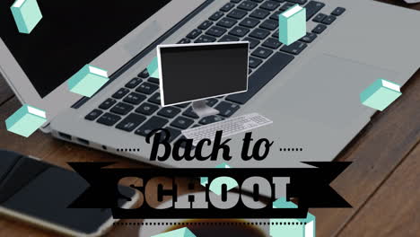 animación del texto de regreso a la escuela en un portátil
