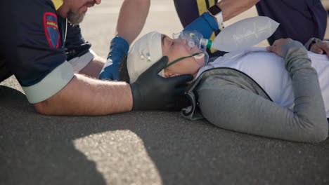 paramedic, woman and oxygen for accident