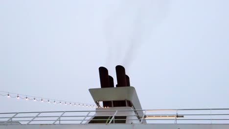 flying smoke from the smokestack on the tallinn helsinki ferry