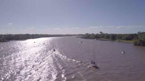 aerial view of the rio de la plata, buenos aires, argentina. the river lujan is full of sailboats enjoying the sunset