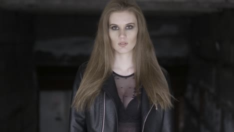 woman in a black leather jacket