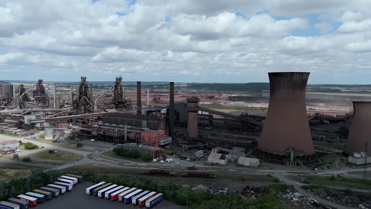 Industrial metalworks in Northern England with chimneys and cooling towers