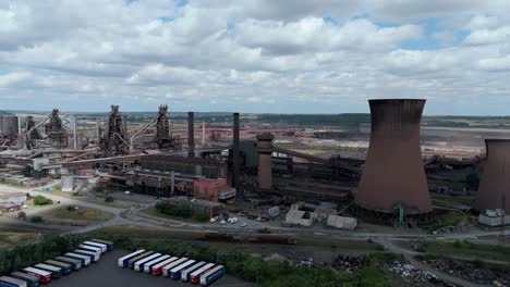 industrial metalworks in northern england with chimneys and cooling towers