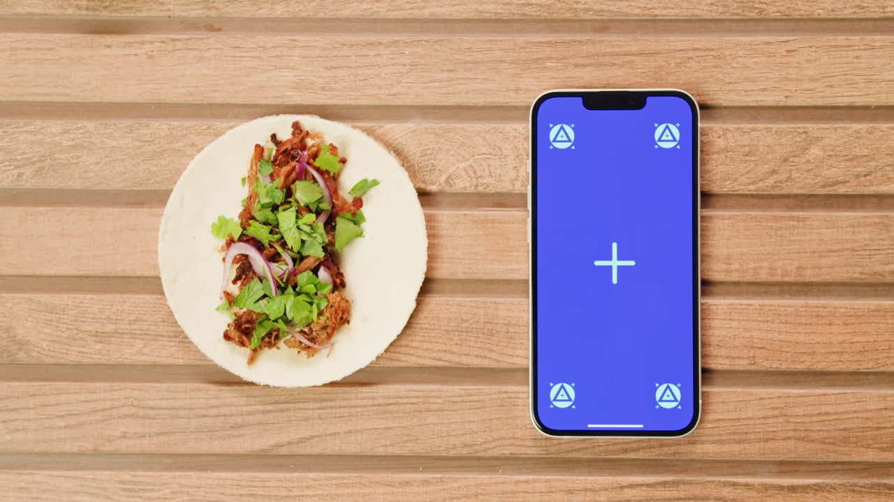 Taco on Wooden Table with Phone