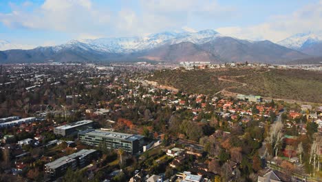 Houses-And-Modern-Buildings-Surrounding-Calan-Hill-In-Las-Condes,-Santiago-de-Chile