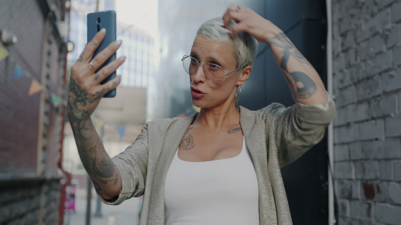 Woman Taking a Selfie in the City