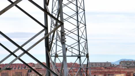 transmission towers, aerial close up view with downward motion