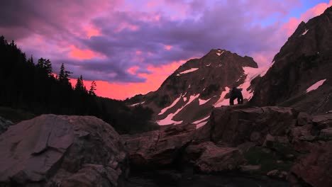 a hiker explores the mt lassen wilderness at dusk