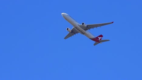 slow motion of a plane flying above sydney nsw australia