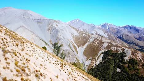 Overhead-summer-view-of-the-Craigieburn-Mountain-Range,-displaying-the-natural-beauty-of-its-peaks-and-valleys