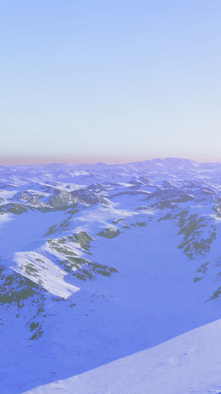 Breathtaking view of snow covered mountains and serene landscape at dawn