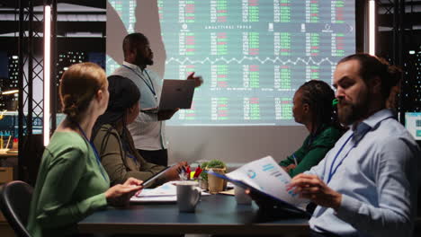 black business analyst evaluates capital funds and revenue data on insight
