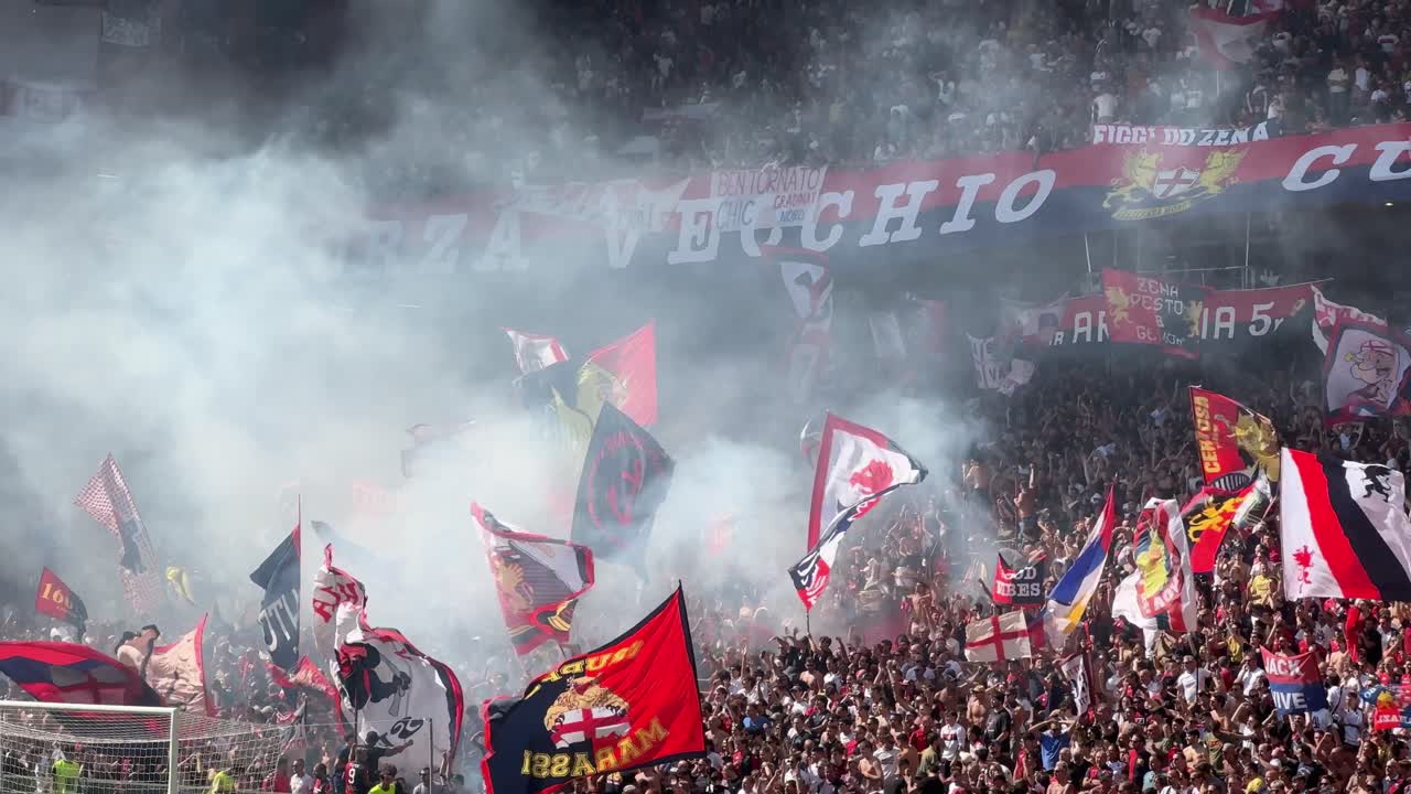 Football supporters of Genoa celebrating.
