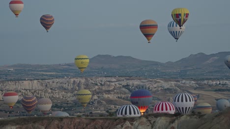 popular tourist activity of hot air ballooning in cappadocia, turkey