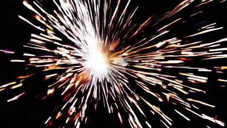 bright sparks flying in the dark