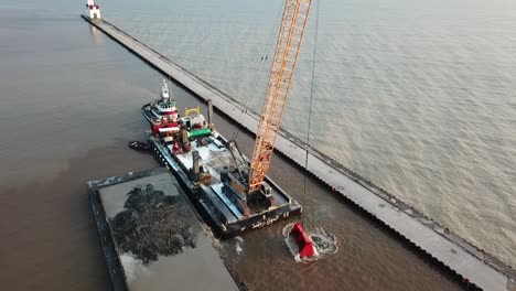 Dredging-operation-in-Kewaunee-Harbor-on-Lake-Michigan,-Kewaunee,-Wisconsin-13