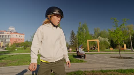 child wearing a helmet outdoors