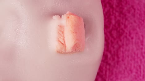 pink marshmallow on white glazed treat