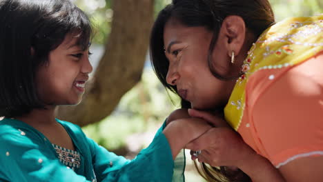 mother and daughter affectionate moment