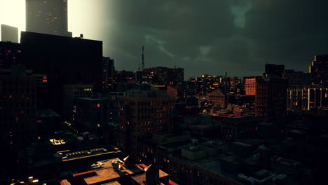 cityscape at dusk/dawn with storm clouds