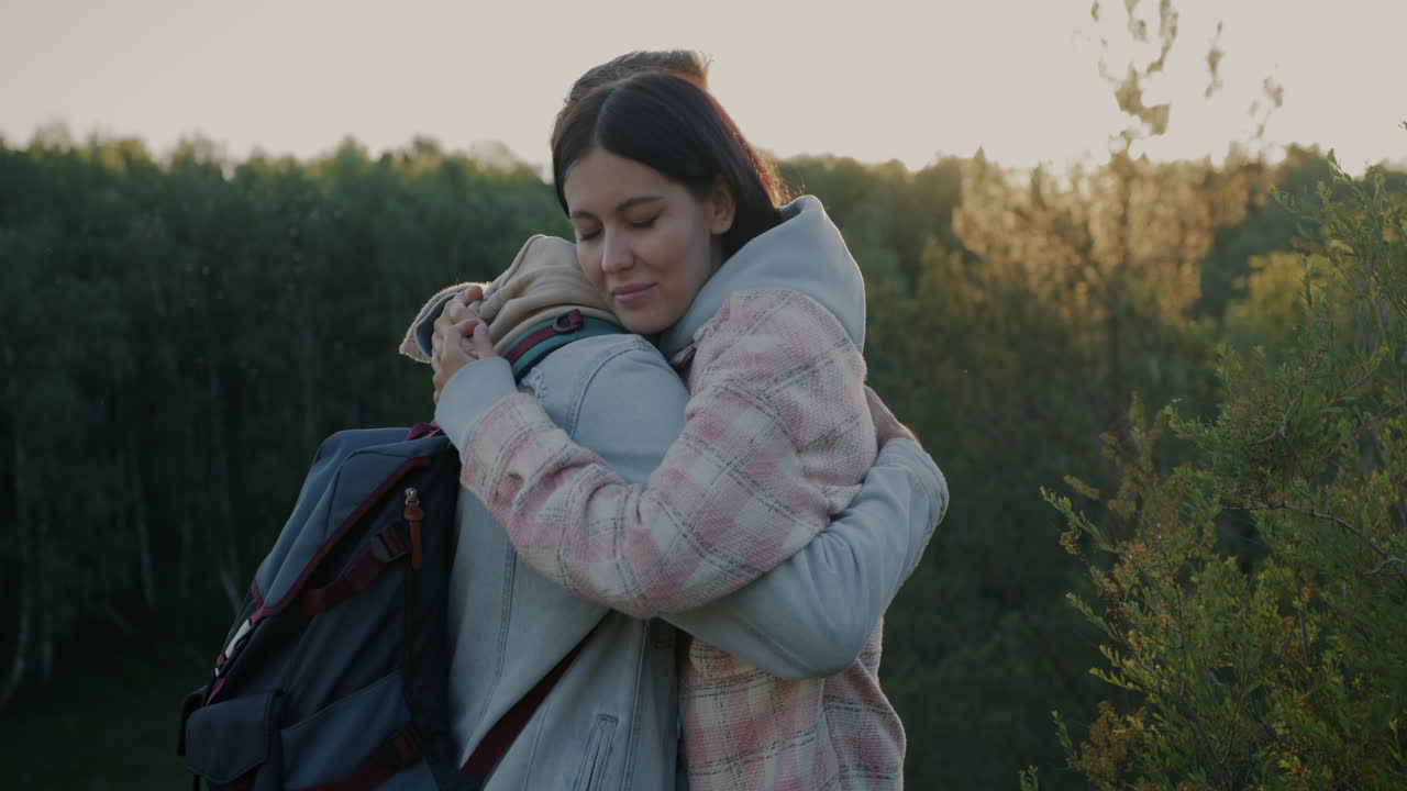 Couple Kissing and Hugging Outdoors