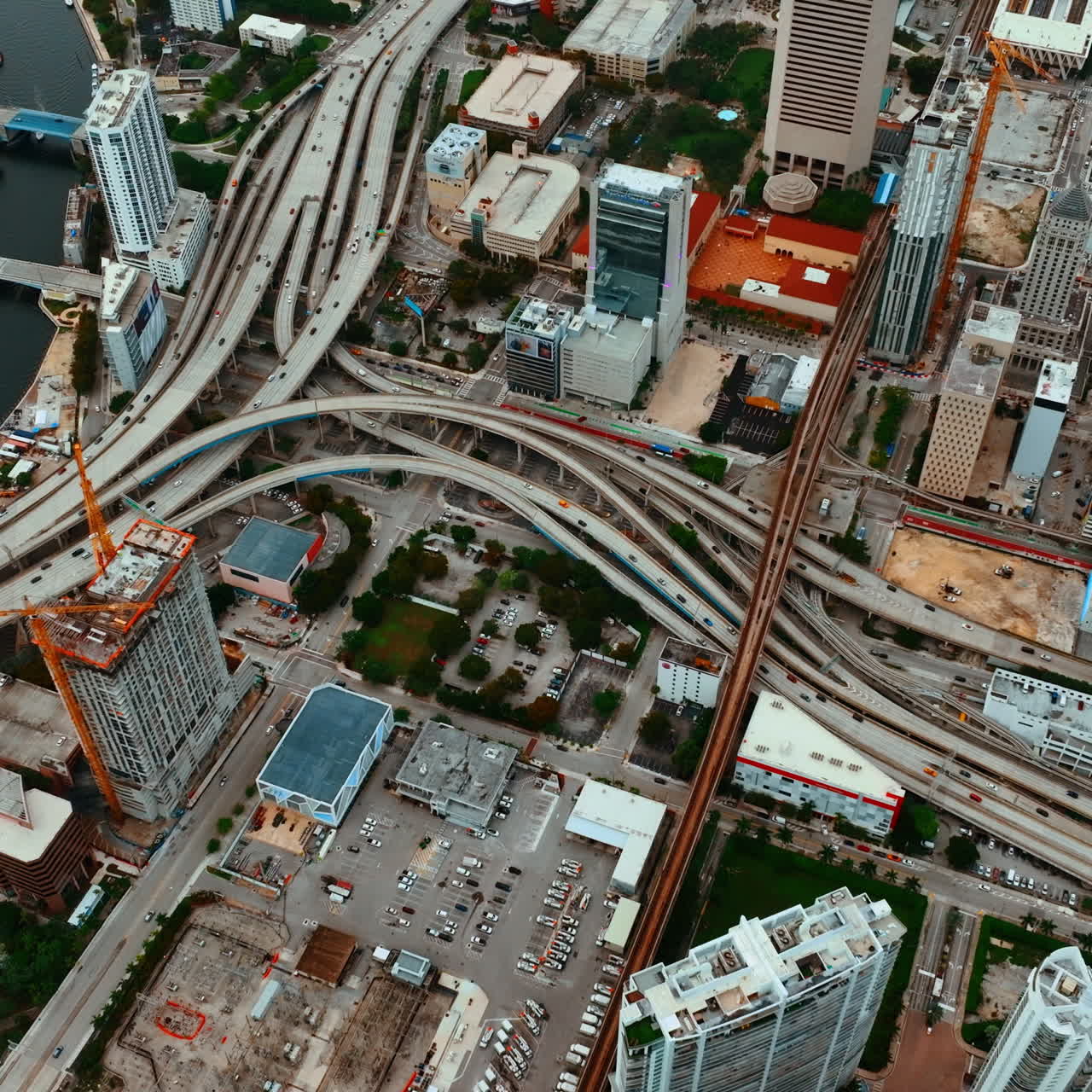 Busy lively city infrastructure with busy transport. Top view on Miami city, Florida, USA at daytime.