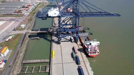 london thamesport,container port river medway kent uk rising drone aerial view